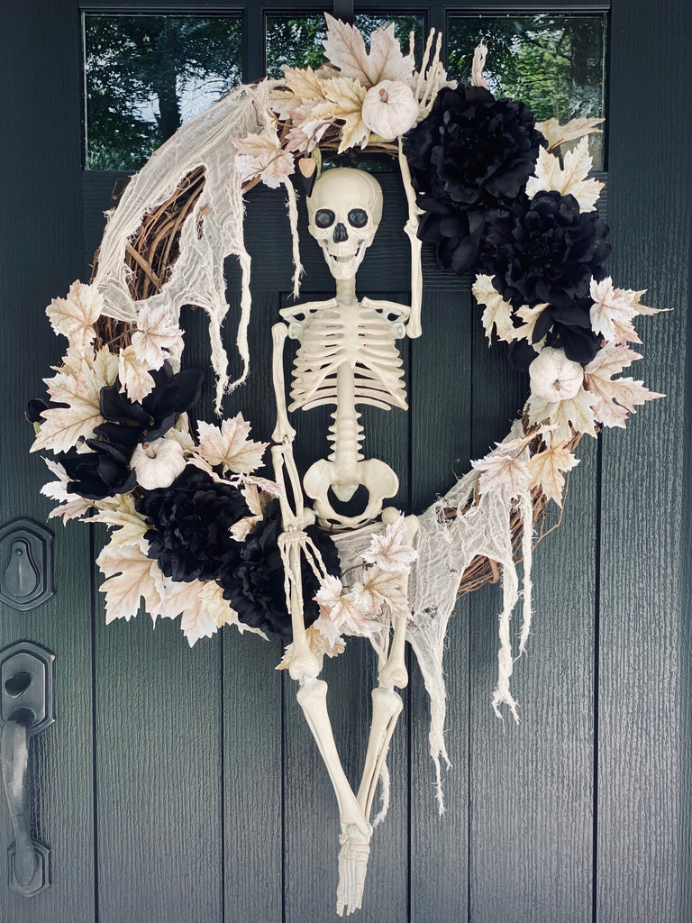XL Halloween Wreath with 36” Skeleton and Black Flowers