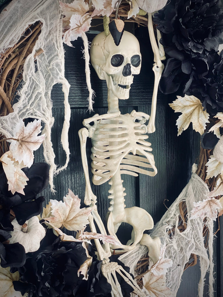 XL Halloween Wreath with 36” Skeleton and Black Flowers